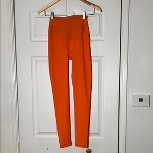 NWOT District Vision Orange Running Legging Small